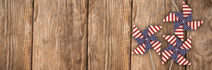 Poster - Composite image of 3d image of pinwheel toy with american flag p