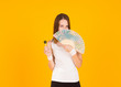 © MFcreated - Young pretty woman with fan, studio