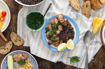 Poster - Beef steak grilled with black quinoa in plate on dark wooden table