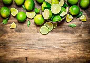 Ripe limes in a bowl.