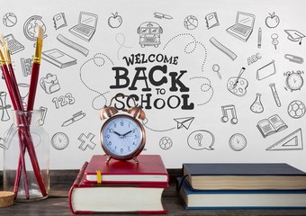 Poster - Books on the table against white blackboard with education graph