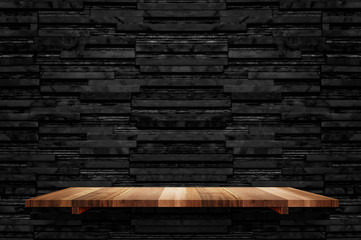 Leinwandbilder - Empty brown plank wood shelf at black layer marble tile wall background,Mock up for display or montage of product or design