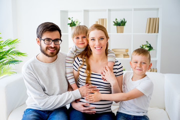 Family with pregnant mother