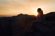 © Mediteraneo - Girl looking at sunset on mountain