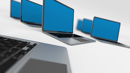 Poster - 3d render of a lot of laptops in a row. Loopable. Depth of field.
