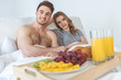 © LIGHTFIELD STUDIOS - couple with breakfast in bed