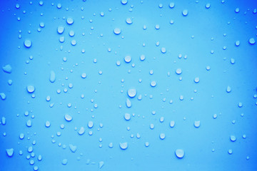 Water drops on blue background