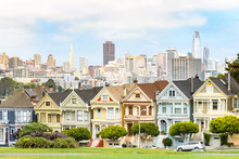 Painted Ladies And San Francisco Skyline At Background View
