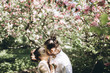© Aleksandr Kuzmin/Blend Images - Beautiful couple kissing under tree