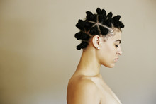 Profile Of Woman With Bantu Knot Hairstyle And Eyes Closed