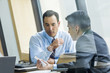© Mike Kemp/Blend Images - Businessmen talking in meeting