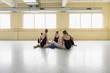 © Mark Edward Atkinson/Blend Images - Girls sitting on floor of ballet studio