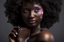 Afro And Flower Beauty  With Big Black Hair Smooth Dark Skin 
