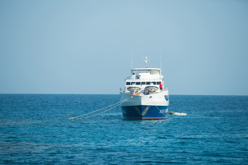 Wall Mural - boat marine transport on background of sky and water