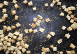 Dark background iron baking sheet crackers bread crumbs
