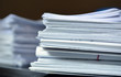 stack of paper files, documents