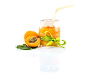 Sticker - Glass jar with apricot jam isolated on white background.