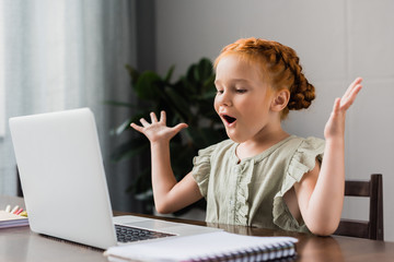 little girl with laptop