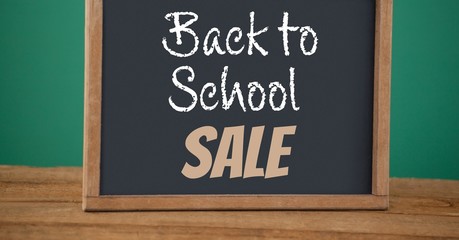 Poster - back to school sale text on blackboard