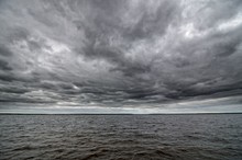 Dark Cloudy Sky And Water