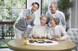 © Blue Jean Images - Happy senior friends taking self portrait with a smart phone