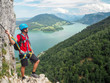 © jzajic - Climber at Mondsee and Attersee, view from Drachenwand rock, via ferrata, Halstatt region, Austria