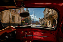 View Of The Road Of Old City Street Through The Windshield Of The Retro Car.