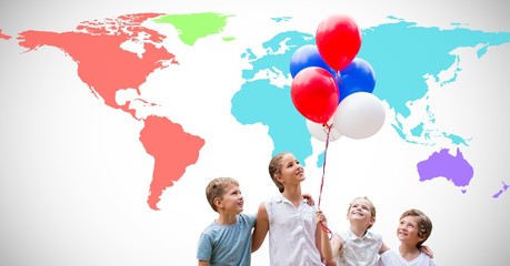 Poster - Kids holding balloons in front of colorful world map