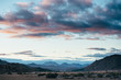 © Micky Wiswedel/Stocksy - mountainous desert landscape at sunset