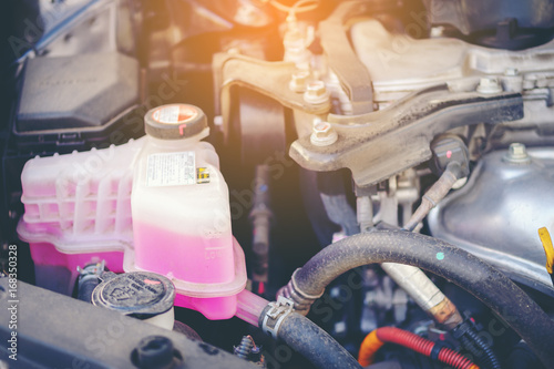 Fotomural Close view of an engine water cooling system of a serviced car