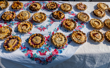 Home baked pies displayed at the local farmer's market.