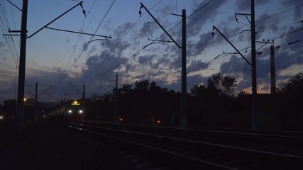 Wall Mural - night movement of trains on a railway