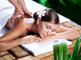 portrait of young beautiful woman in spa environment.  