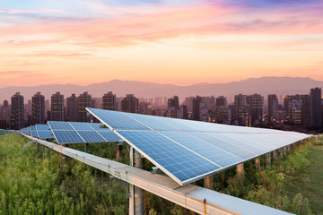 Wall Mural - solar panels with the sunny sky. Blue solar panels. background of photovoltaic modules for renewable energy.