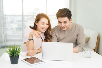 young asian businesspeople at meeting in office