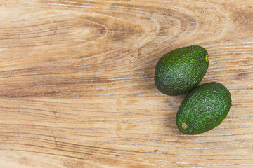 Canvas Print - avocado on a dark wood background. tinting. selective focus