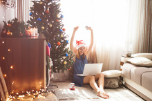 Cute Young Woman Shopping Online - Holding Credit Card And Feeling Happy In Awaiting Christmas Holiday