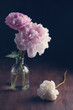 Vintage still life with beautiful peonies