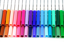 Colorful Markers In A Row Isolated On White Background