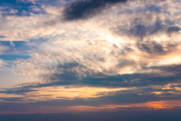 Beautiful sky with clouds and sunshine at sunset