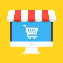 Computer With White Shopping Cart Icon On Screen And Storefront Awning. Ecommerce, Online Shopping, E-commerce, Internet Marketplace Concepts. Modern Flat Design. Vector Illustration