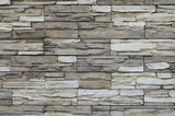 Fototapeta  - Abstract background, texture of the wall surface of the treated stone