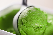 Scooping Green Ice Cream Close Up