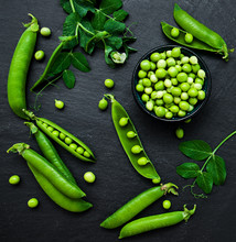 Green Peas On A Stone Background