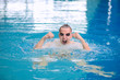 © lenets_tan - Male swimmer at the swimming pool. Underwater photo