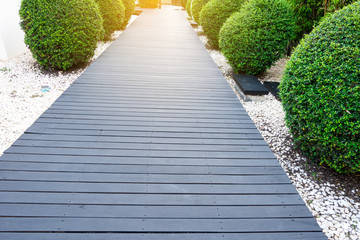 Black wooden garden path.