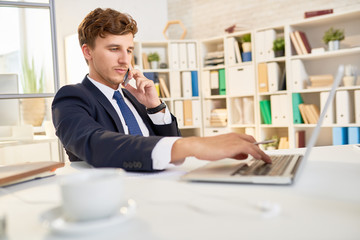 Wall Mural - Confident Businessman Working in Office