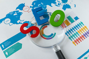 Aufkleber - search engine optimization concept as colorful alphabet abbreviation seo on magnification glass on p