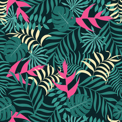 Tropical background with palm leaves and flowers. Seamless floral pattern