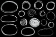 set of hand drawn chalk circles isolated on black background